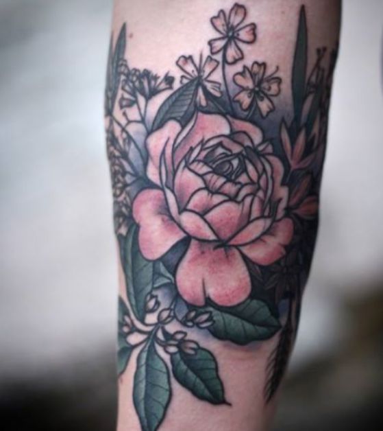 Flores Muñeca Tattoo