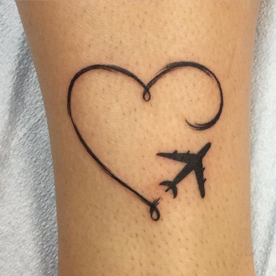 corazon y airplane tatoo