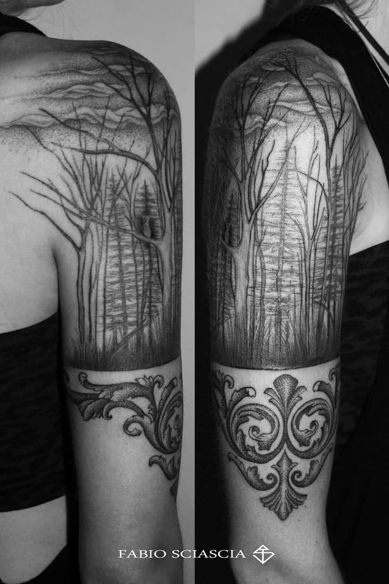 arbol seco tatuado en el brazo