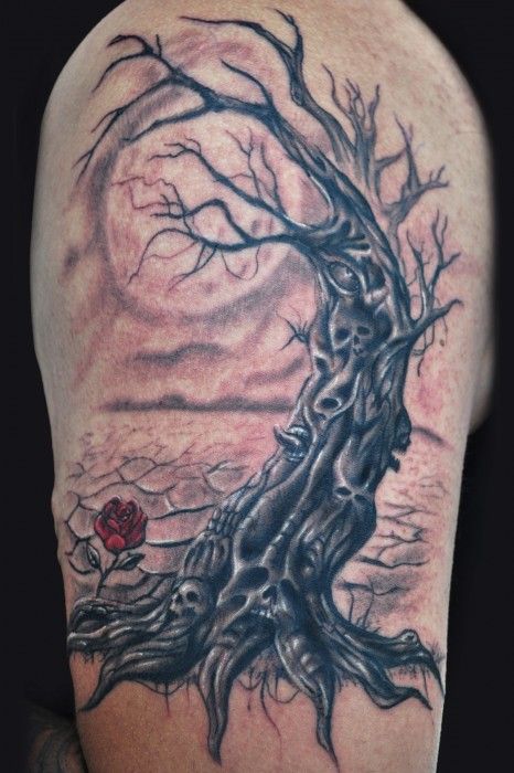 arbol y rosa en el brazo