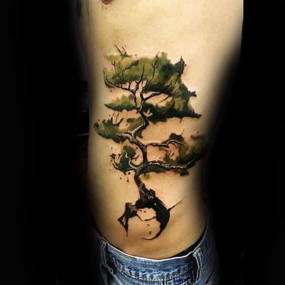 tatuaje arbol bonsai hombres costillas