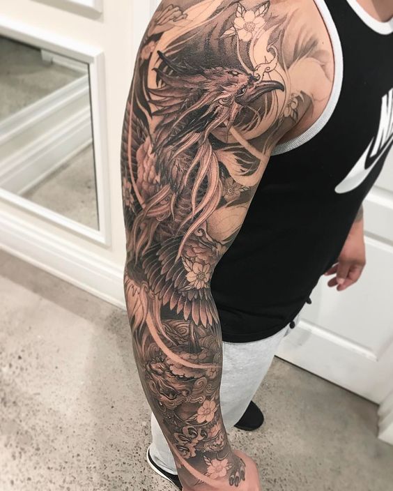 Tatuaje De Ave Fenix En El Brazo (2)